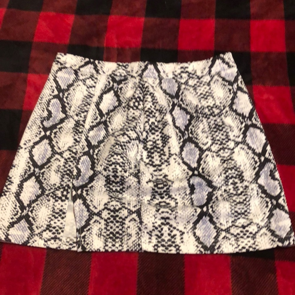 Black and white snake print skirt with a little front slit